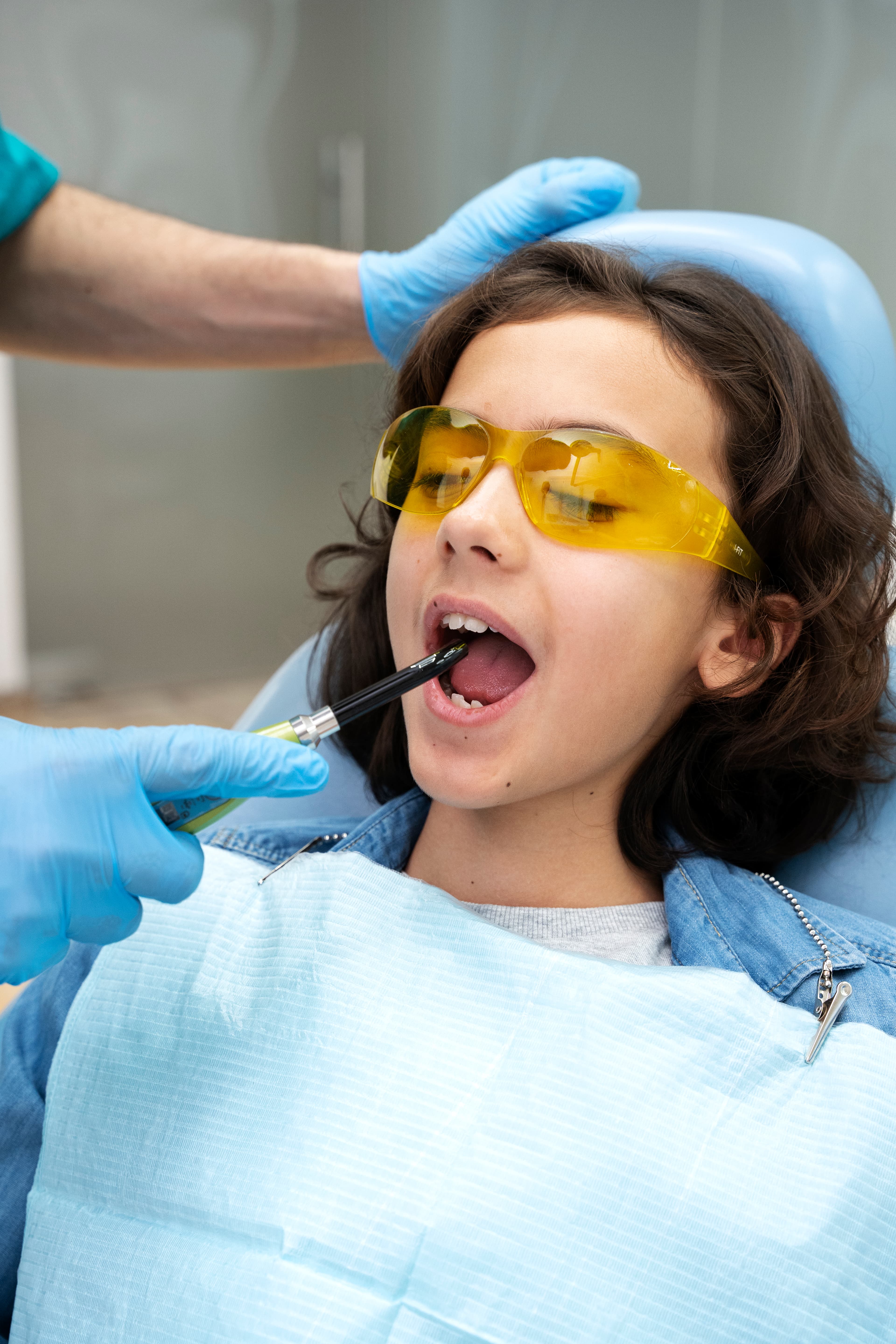 Dentist examining tooth